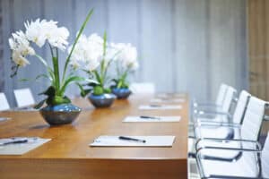 White flowers on conference table